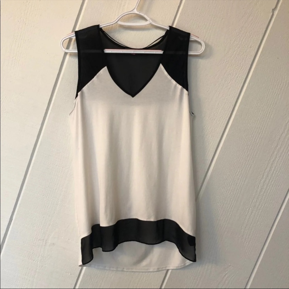 Two-tone, peekaboo tank. Cream and white.